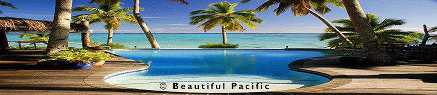 outlook through palm trees at a luxury resort in the cook islands